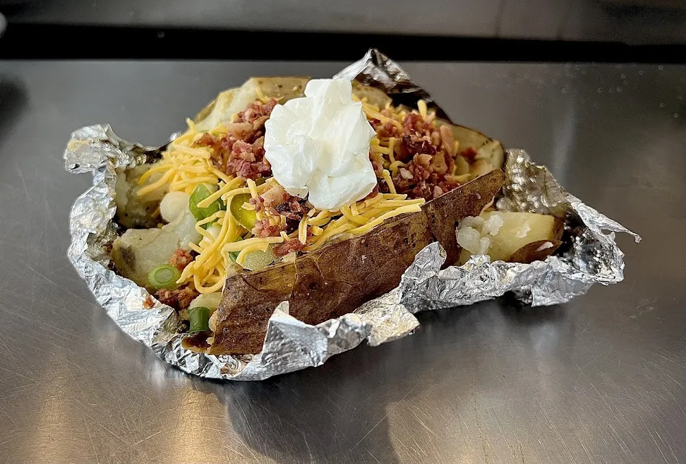 Korina's Jumbo Baked Potato w Slaw & One Side